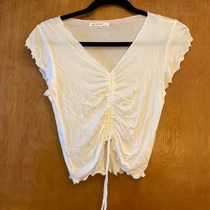 White cinched front tee
